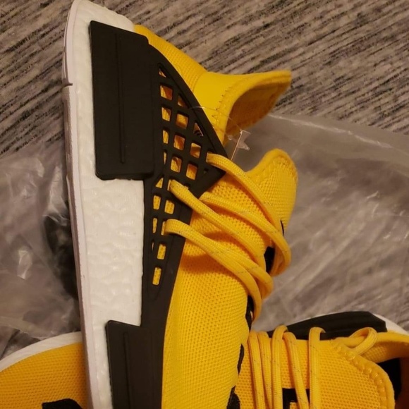human race shoes yellow